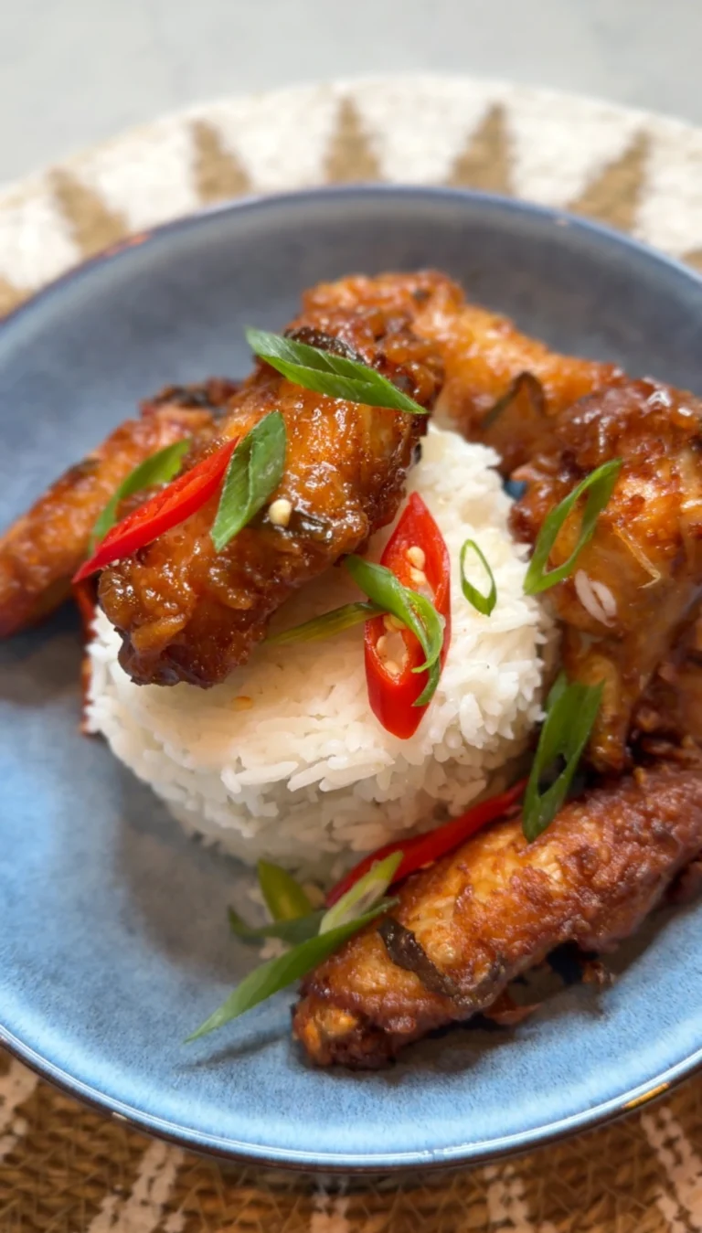 Filipino crispy chicken wings recipe seasoned with sinigang spices for a tangy comfort dish.