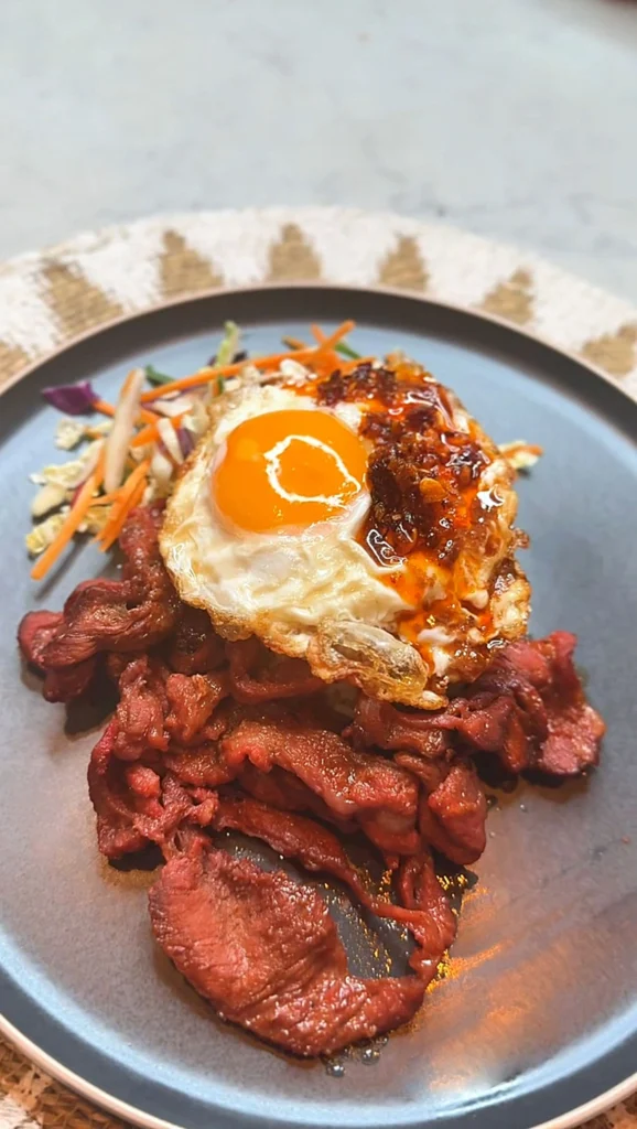 Filipino tocino breakfast dish with sweet and savoury caramelised pork