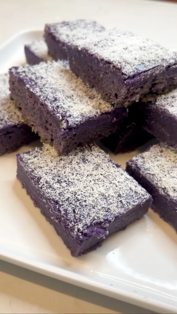 Fudgy ube slice with cheesecake swirl and white chocolate on top