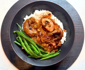 Filipino-style Asado Osso Bucco served with jasmine rice and garlic butter green beans.